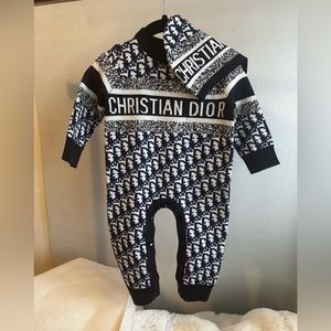 Baby boy, sweater type onesie.